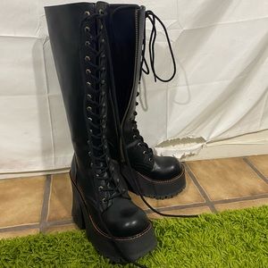 Delia’s knee high lace up boots